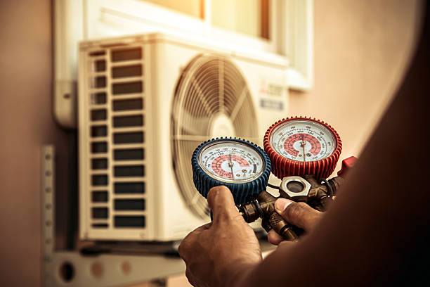 Professional Heat Pump Repair technician working in Edgerton, WI
